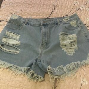 SHEIN Light Blue Ripped Denim Shorts with Frayed Hem